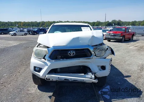 2014 Toyota Tacoma Base V6 z USA, uszkodzony, nr VIN 3TMLU4EN5EM149635